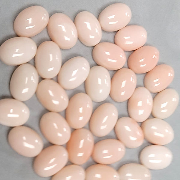 10X14MM OVAL CABOCHON  NATURAL ANGLE SKIN CORAL
